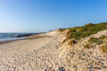 Eroded dune in Esposende, Portugal. Sand loss from a dune under wave attack.