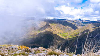 watching the mist cover the natural landscape in the Andes of Peru