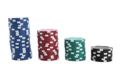 Stacks of casino poker chips on white background