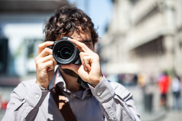Photographer using his camera