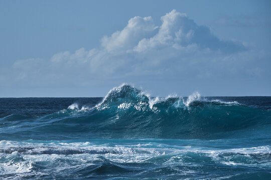 Wave break with sky and clouds