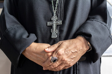 Crucifix of a priest from the Greek Orthodox Church hanging from a silver chain