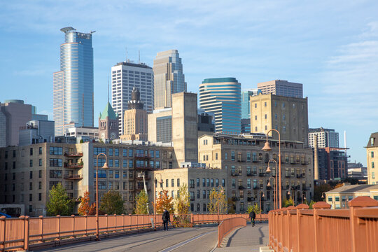 City Skyline of Minneapolis Minnesota with a pretty view from a bridge over the Mississippi River