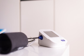 Digital blood pressure and heart rate monitor white color with black cuff