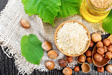 Flour in bowl with oil on board top