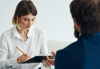 Obraz premium woman and man suit documents communication people resume