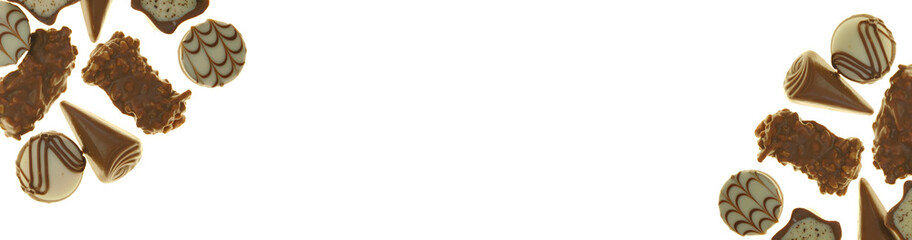 Chocolate candies. Sweets and chocolate banner. Box of sweets isolated on white background.Assortment of chocolate truffles. A set of sweets.