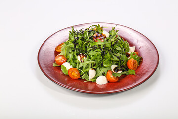 Salad with mozzarella, tomato and rucola