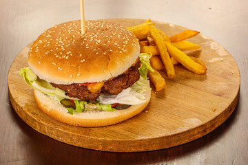 Burger with beef, vegetables and cheese