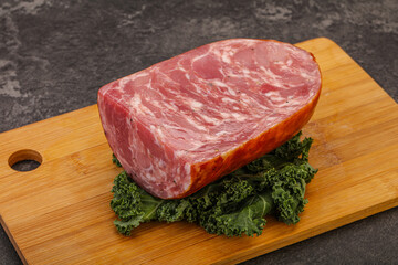 Beef ham piece over board