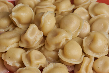 a lot of delicious dumplings are on the plate