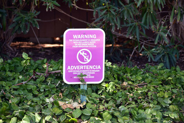 Warning reclaimed water purple sign