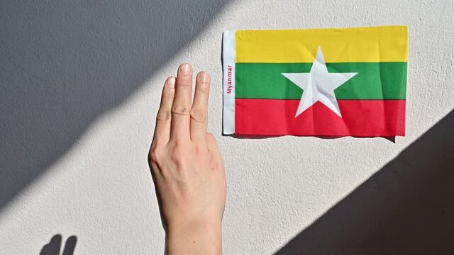 Footage of protester showing three-finger salute to against the Myanmar military coup. This gesture becoming a symbol of resistance and solidarity for democracy movements across south-east Asia.