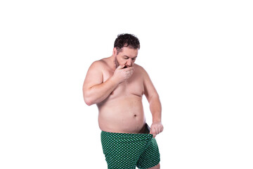 Funny fat man and male health problems. © vladorlov