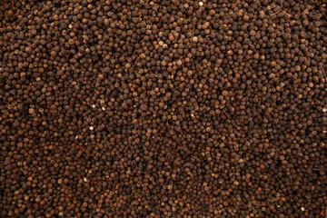 Dry organic Black Pepper top view background or texture. Healthy spices, seeds and herbal products.