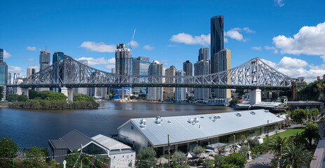 View of the Brisbane skyline looking over the Howard Smith Wharves, Brisbane River and the Story Bridge - obrazy, fototapety, plakaty