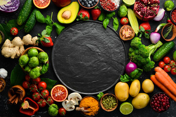 Fresh vegetables and fruits: fennel, avocado, pomegranate, berries, cabbage and basil. Organic...