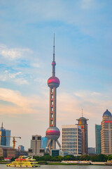 Fototapeta na wymiar Oriental Pearl TV Tower at dwan around Bund areal in Shanghai, China