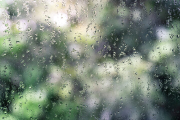 Water drop on window in rainy season - 426961404