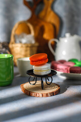 Various macaroons with pistachios,fruits,berries,coffee beans.