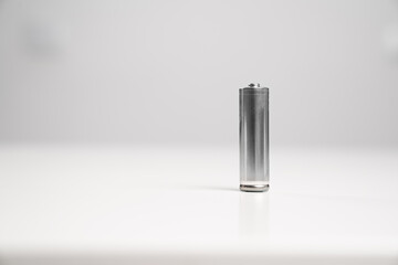 18650 Li-ion silver battery salt and alkaline GP R6 on a white background. disposable and...
