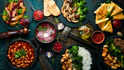 Food. Set of dishes on the table. On a wooden background. Top view. Copy space.
