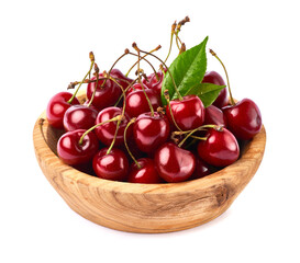 wooden bowl of sweet cherry fruits isolated on white background