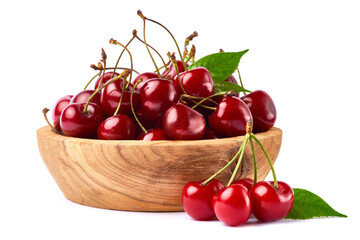 wooden bowl of sweet cherry fruits isolated on white background