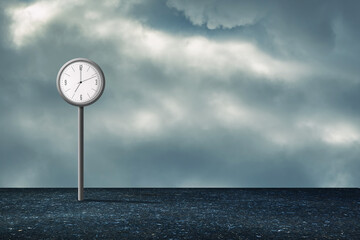Lonely Street Clock, against the background of clouds. Copy space. Time concept.