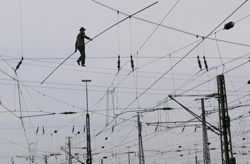 Auf dem Hochseil - Balance halten