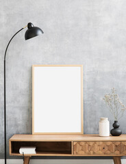 Blank picture frame mockup on gray wall. Living room design. View of modern style interior. Home...