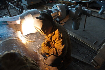 Petropavlovsk, Kazakhstan - 05.26.2015 : Employees are engaged in construction, installation and welding work on the territory of the power plant