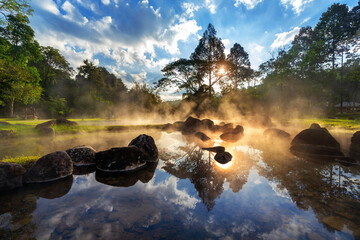 Chae Son Hot Spring National Park at sunrise in Lampang province, Thailand.