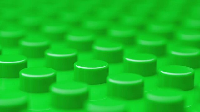 Button geen plastic background abstract. Useful as abstract background.
