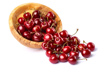 wooden bowl of sweet cherry fruits isolated on white background