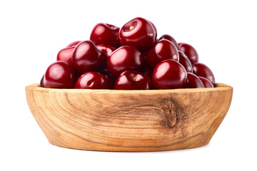 wooden bowl of sweet cherry fruits isolated on white background