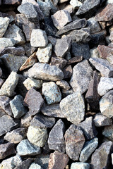 The results of grinding andesite from the mountains are converted into small particles as building materials with a size of 0.5 cm.