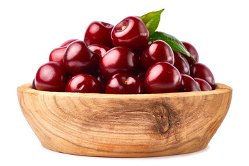wooden bowl of sweet cherry fruits isolated on white background