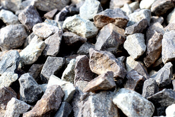 The results of grinding andesite from the mountains are converted into small particles as building materials with a size of 0.5 cm.