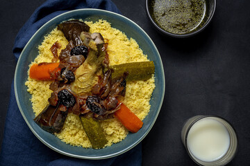 Traditional homemade couscous with chicken and vegetables.