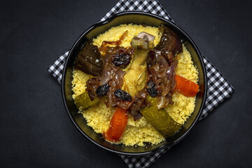 Traditional homemade couscous with chicken and vegetables.