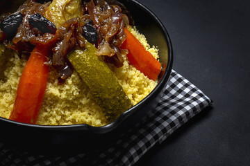 Traditional homemade couscous with chicken and vegetables.