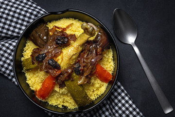 Traditional homemade couscous with chicken and vegetables.