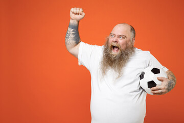 Fat man pudge football fan in white t-shirt cheer up support favorite team with soccer ball do...