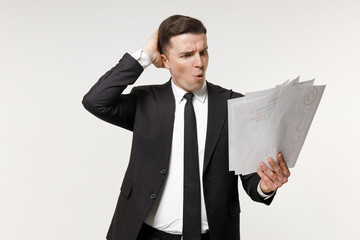 Young shocked wondered employee business corporate lawyer man in classic formal black grey suit...