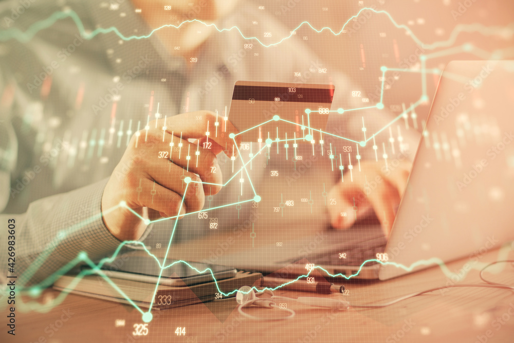 Poster double exposure of man hands holding a credit card and forex graph drawing. stock trading and digita