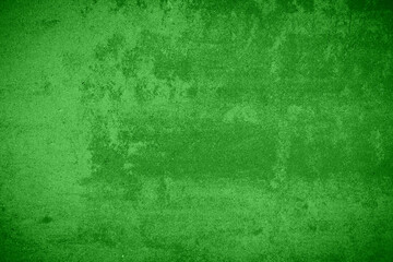 Closeup of green textured grunge background. Green wall edges. 