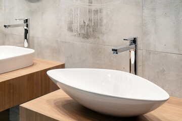 Water tap and sink in the bathroom. The interior of the living quarters.