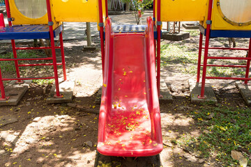 Children Playground slide at park.