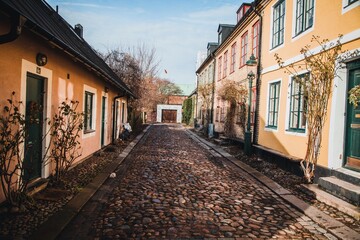 Fototapeta na wymiar View down the cobblestone streets in Lund, Sweden